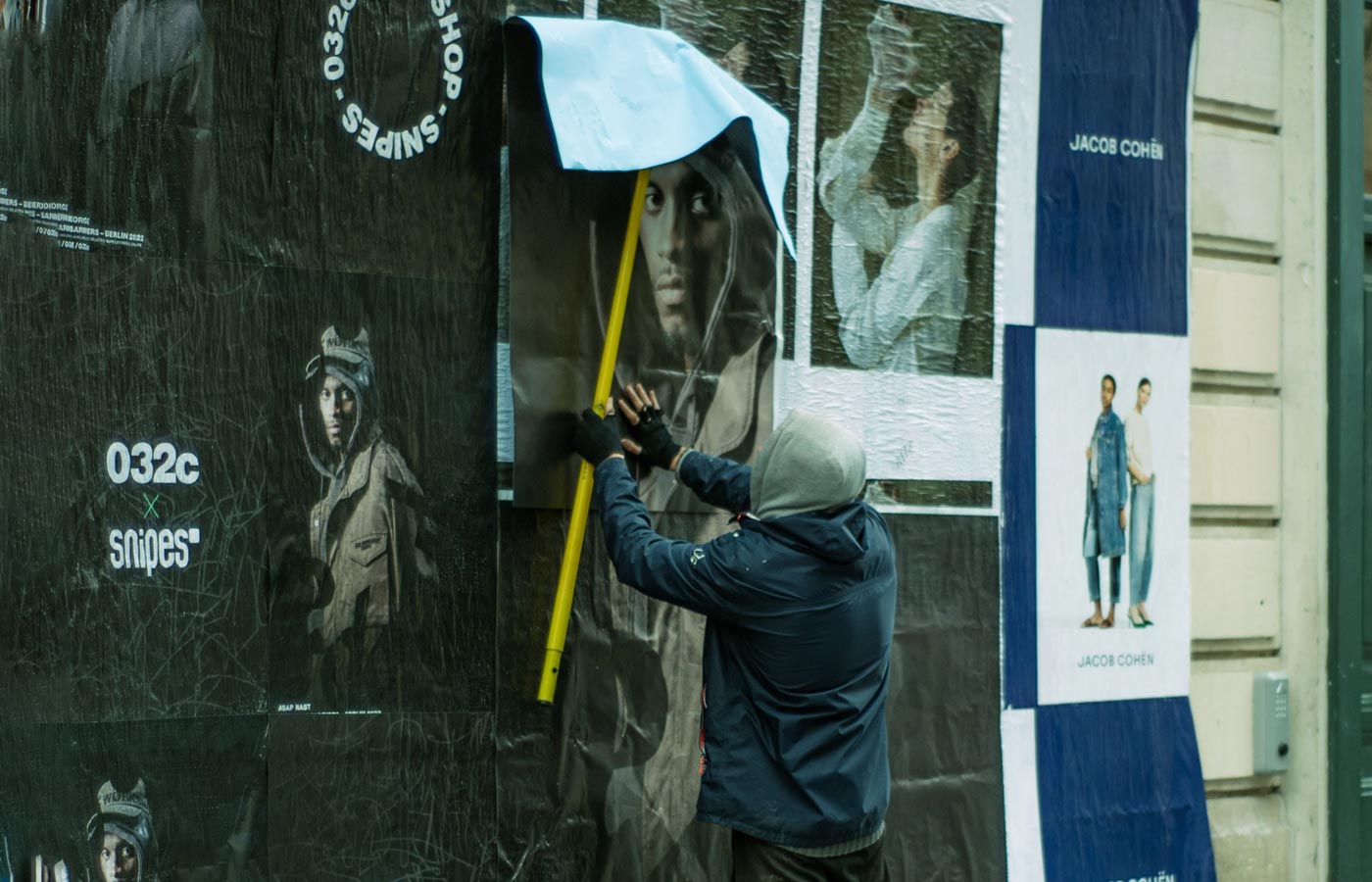 Wheatpaste poster installation by street teams in NYC